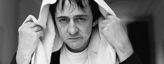 influenza - sick man with towel on his head